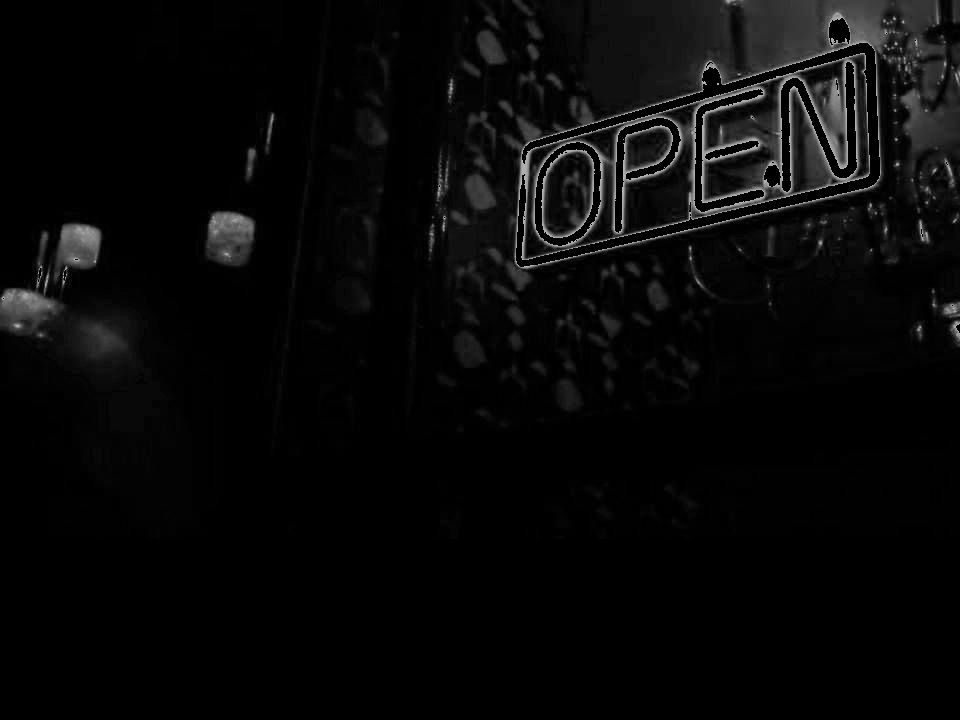An 'Open' sign in the dark (c) Danny Ryder Photography
