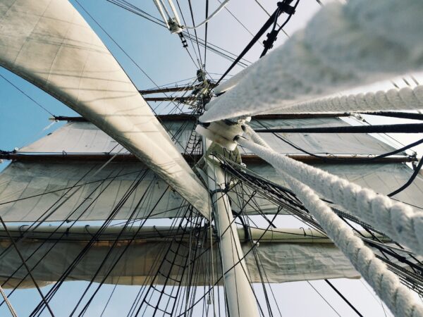A view up through a tall ship's rigging