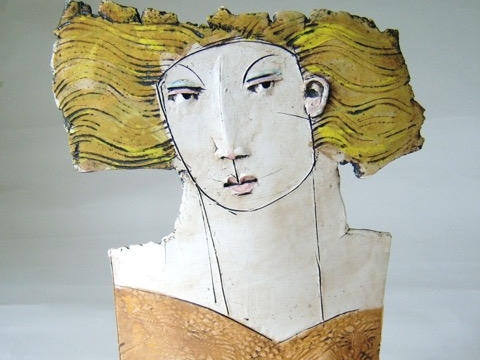 Close up detail of a ceramic statute of a women by Christy Keeney