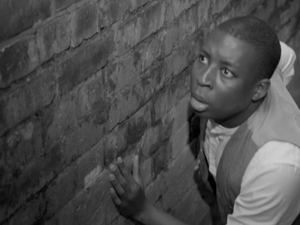 Still, taken from film, about the killing of Charles Wootton during the 1919 Race Riots in Liverpool.