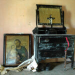 Mirrored dresser and religious artifacts