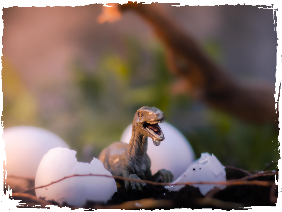 Toy dinosaur appears (as if from the shell of a recently broken egg). (c) Jonantes0 via Pixabay
